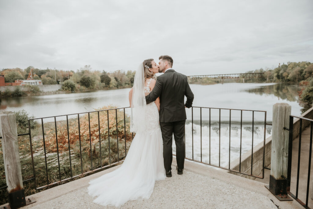 Husband and Wife overlooking the waterfront at Cambridge Mill